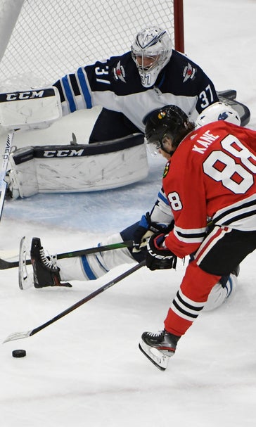 Kane gets 1,000th point, Blackhawks beat Jets 5-2